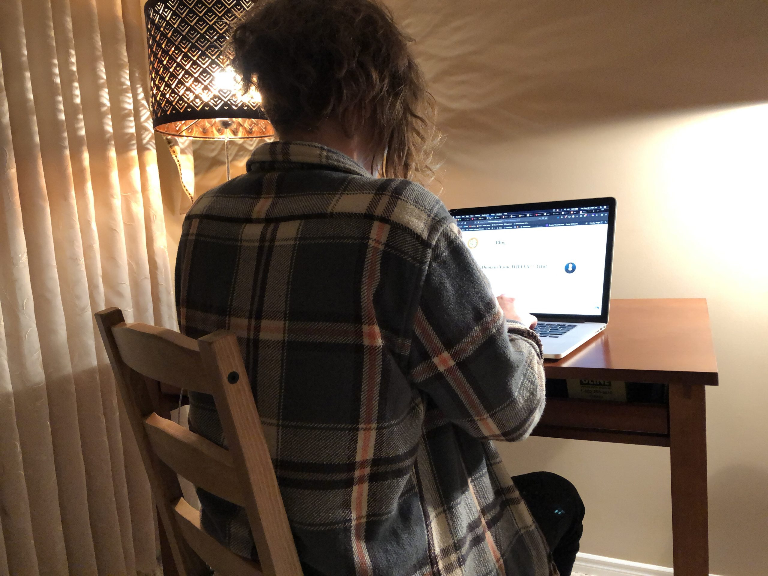 Paige typing away late at night